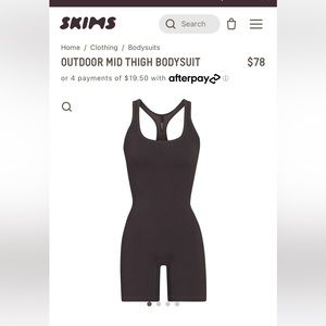 SKIMS outdoor mid thigh bodysuit in ONYX